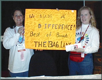 Turning over the ACS checks to PL Help Desk in Vegas Saturday, July 22, 2000